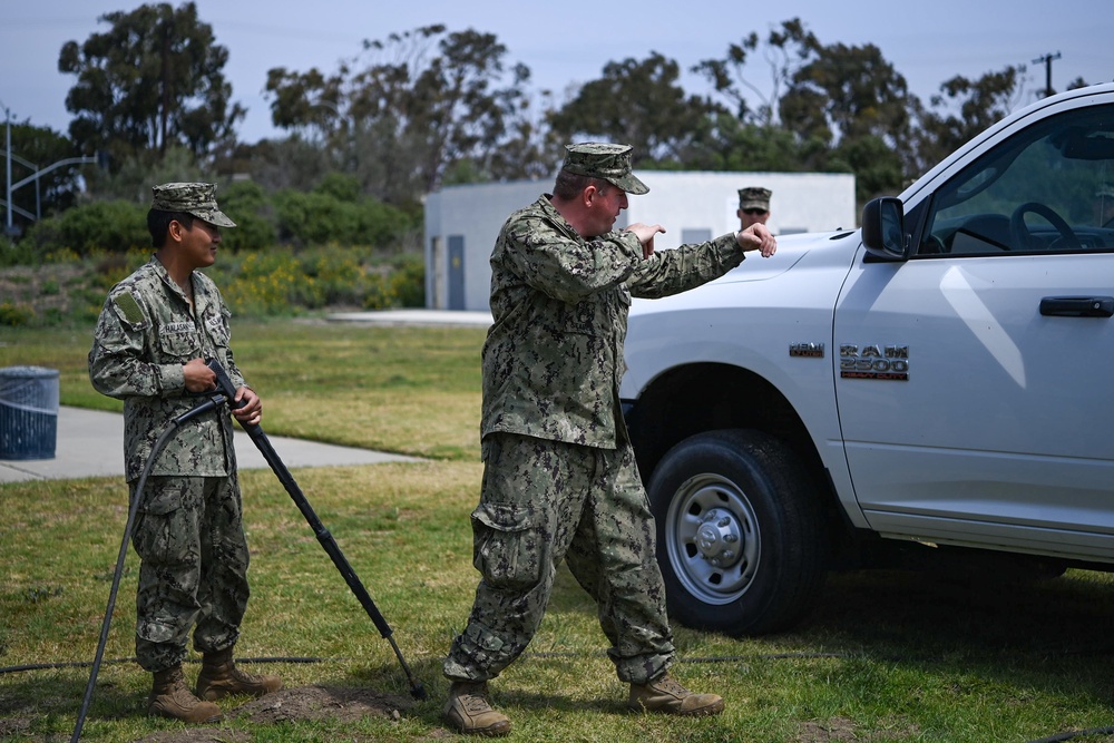US Navy Seabees with NMCB-5 train on decon of simulated CBR contaminates