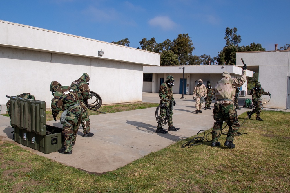 US Navy Seabees with NMCB-5 train on decon of simulated CBR contaminates