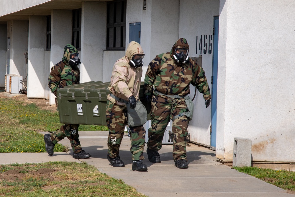 US Navy Seabees with NMCB-5 train on decon of simulated CBR contaminates
