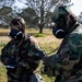 US Navy Seabees with NMCB-5 train on decon of simulated CBR contaminates