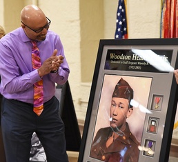 Ceremony marks new name for RIA Health Clinic to Woodson Health Clinic, honoring World War II combat medic