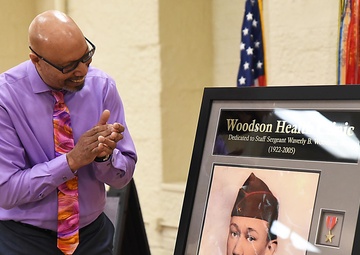 Ceremony marks new name for RIA Health Clinic to Woodson Health Clinic, honoring World War II combat medic