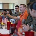 Sgt. Dakota Meyer visits with 2nd Marine Logistics Group service members