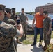 Sgt. Dakota Meyer visits with 2nd Marine Logistics Group service members