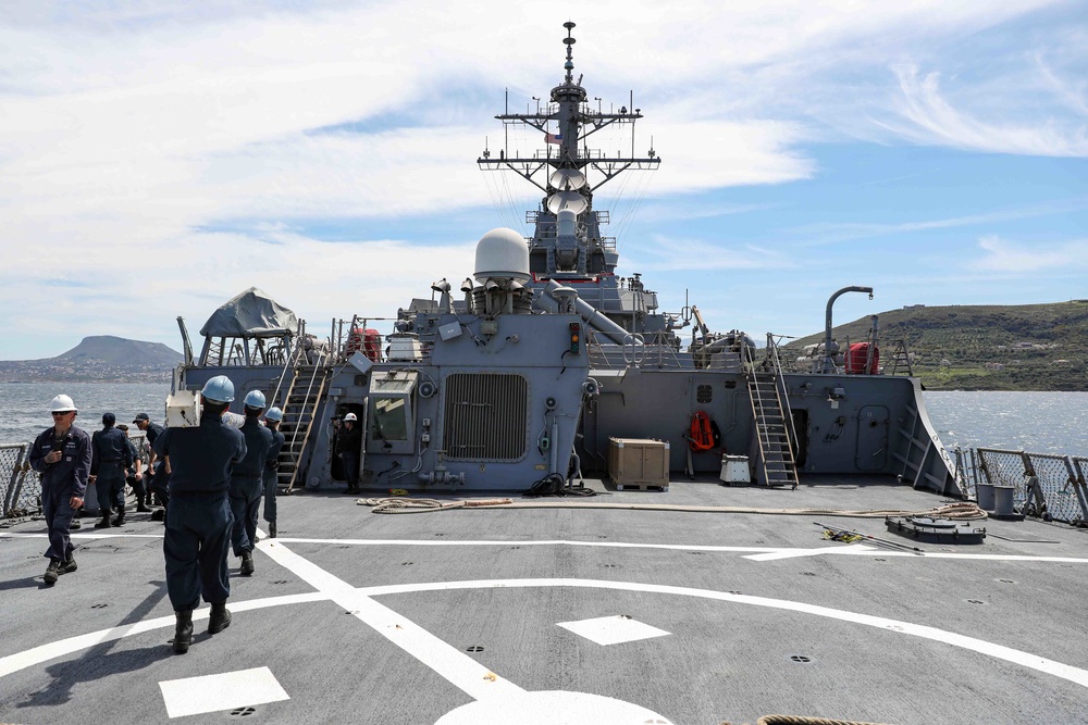 USS Ross leaves port in Souda Bay, Greece