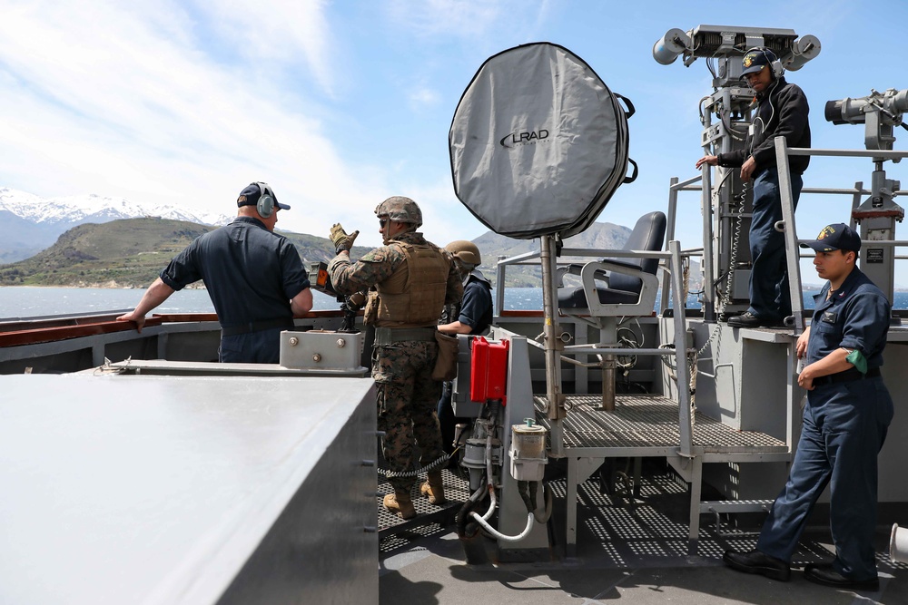 USS Ross leaves port in Souda Bay, Greece