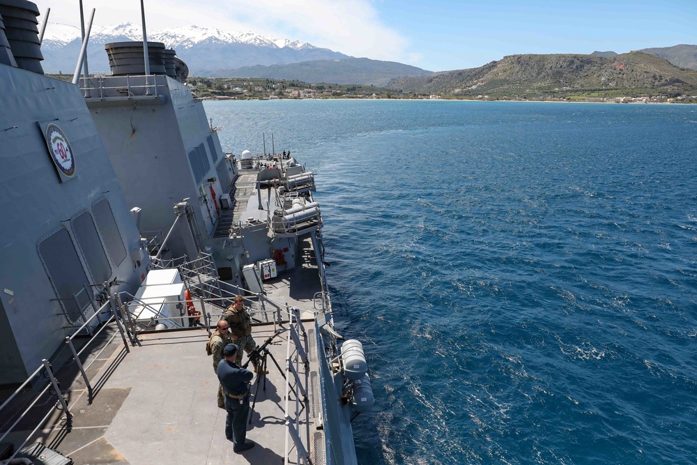 USS Ross leaves port in Souda Bay, Greece