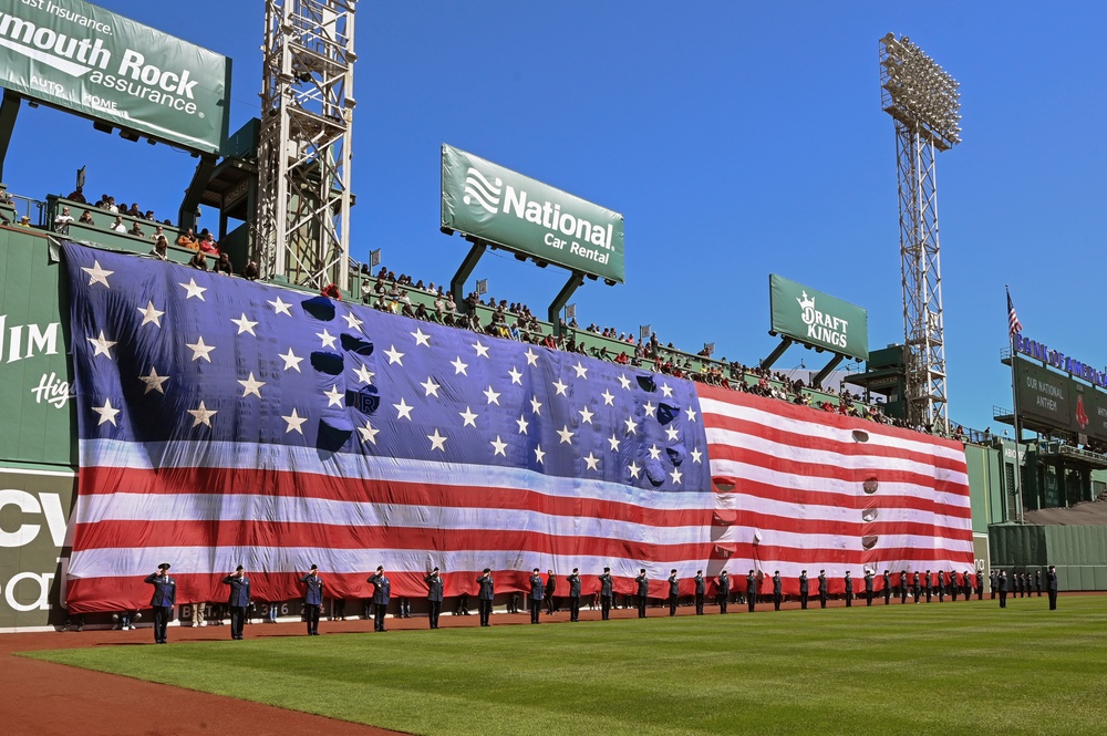 Airmen support Patriots Day pre-game flag detail