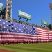 Airmen support Patriots Day pre-game flag detail