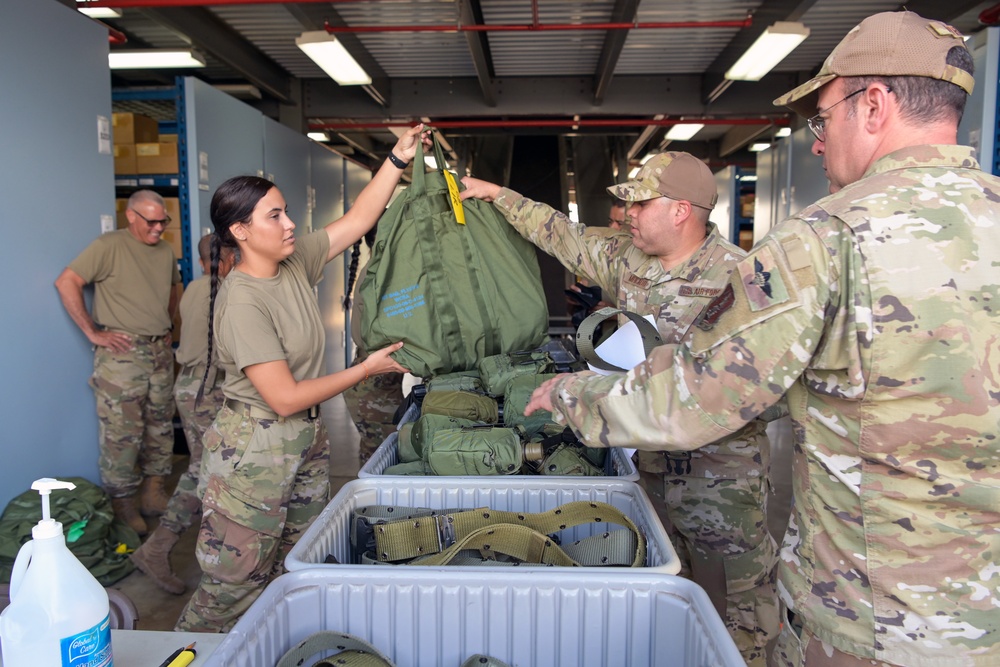 156th CRG Airmen issued CBRN gear prior to departure to Southern Strike