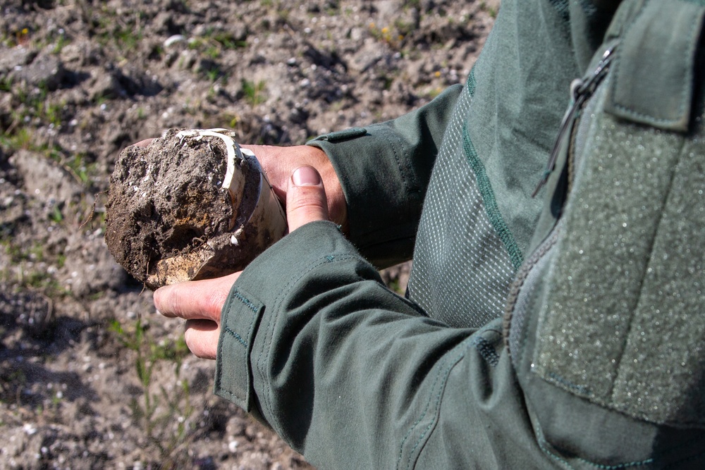 Explosive Ordnance Disposal cleaning Bombing Target 11