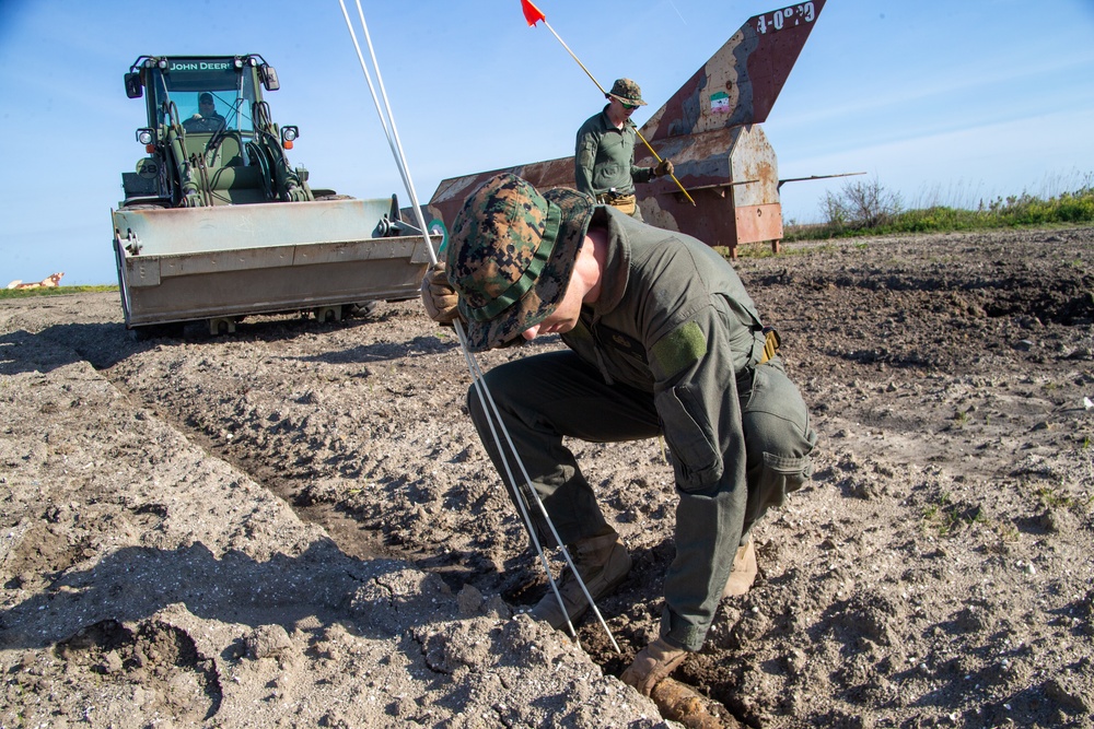 Explosive Ordnance Disposal cleaning Bombing Target 11