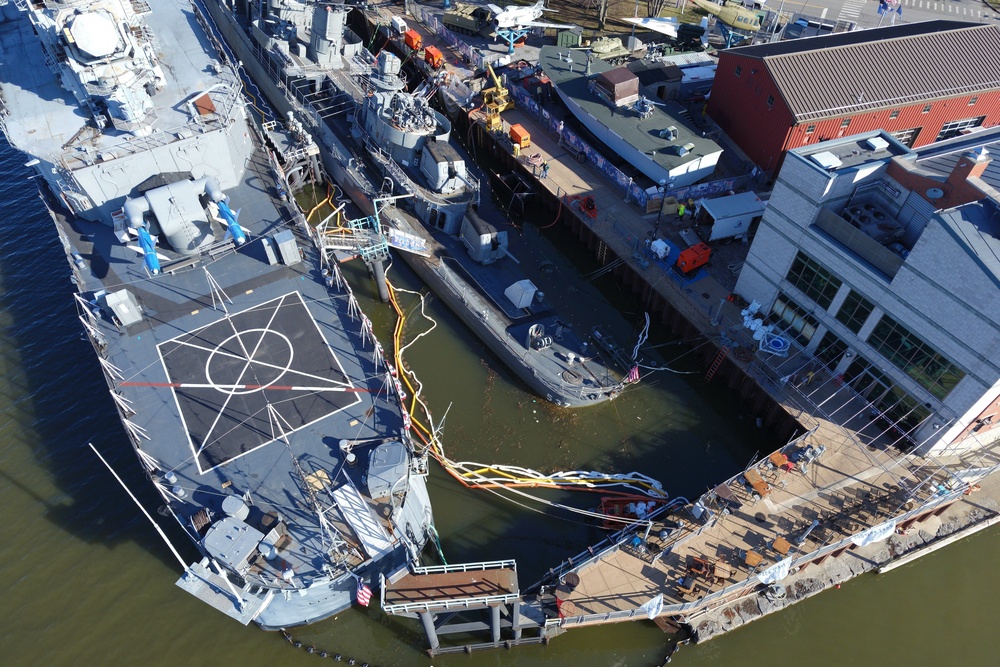 U.S. Coast Guard responds to partially sinking U.S.S. The Sullivans at the Buffalo Naval Park