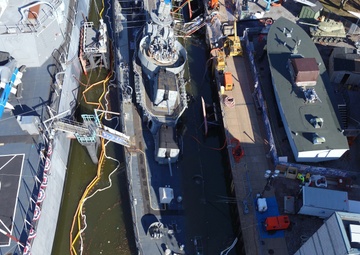 U.S. Coast Guard responds to partially sinking U.S.S. The Sullivans at the Buffalo Naval Park