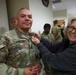 Command Sgt. Major Serrano is presented a 360 Leaders' Course pin during Graduation