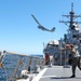 U.S. Marines launch a small unmanned aircraft system from USS Ross