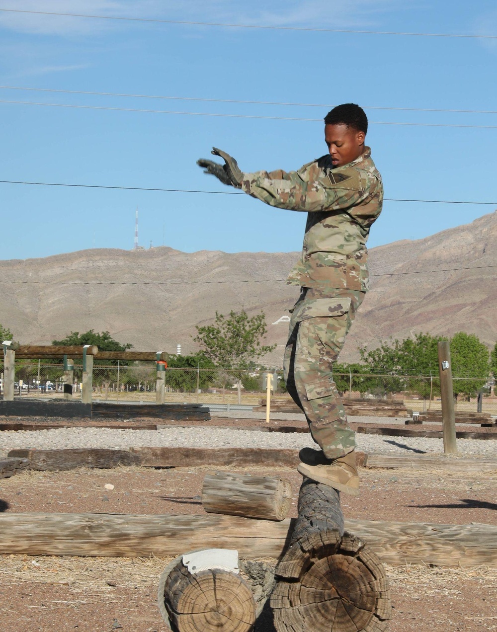 Tackling obstacles in the 1st Armored Division Iron Squad Competition