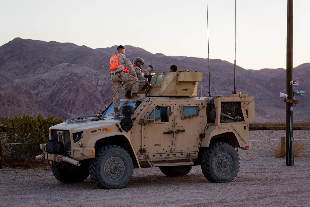 U.S. Marines with Combat Logistics Battalion 1 conduct a mounted live-fire range