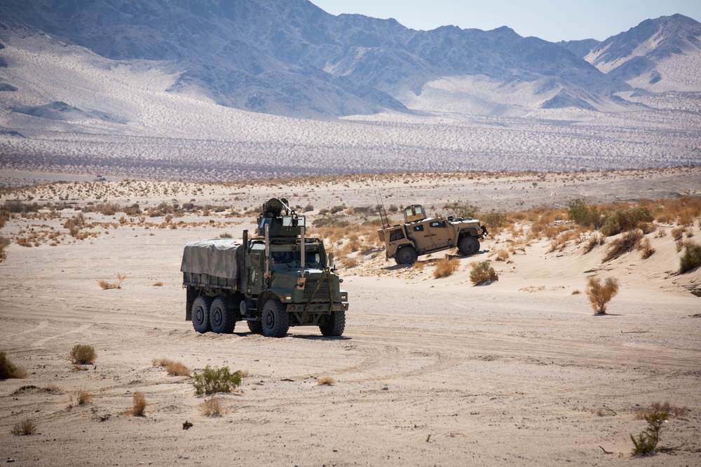 U.S. Marines with Combat Logistics Battalion 1 conduct a mounted live-fire range