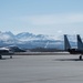 California Air National Guard F-15 Eagles support F-22 Raptors in Alaska
