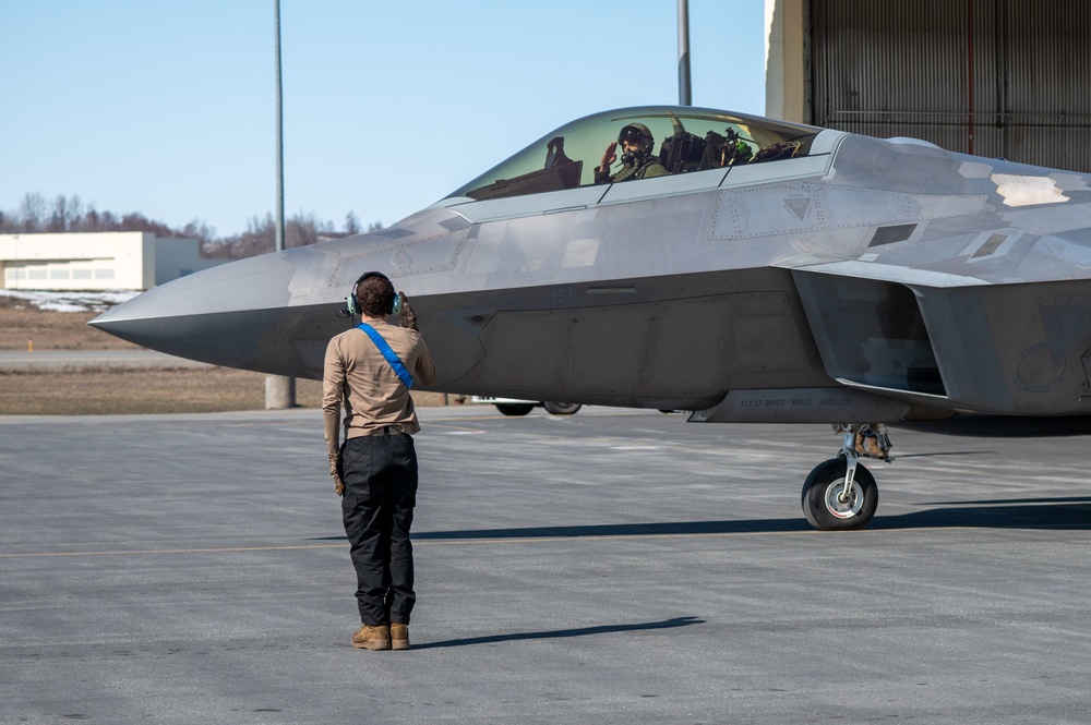California Air National Guard F-15 Eagles support F-22 Raptors in Alaska
