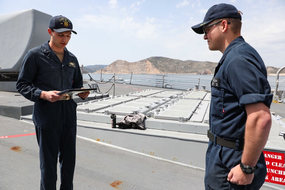 USS Ross Sailor reenlists aboard the ship