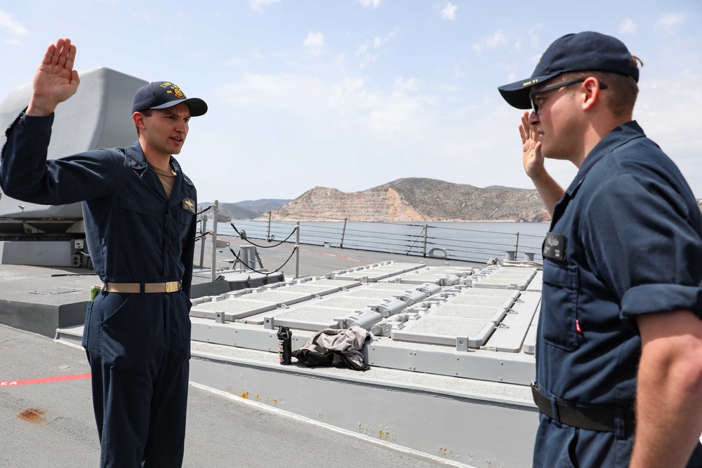 USS Ross Sailor reenlists aboard the ship