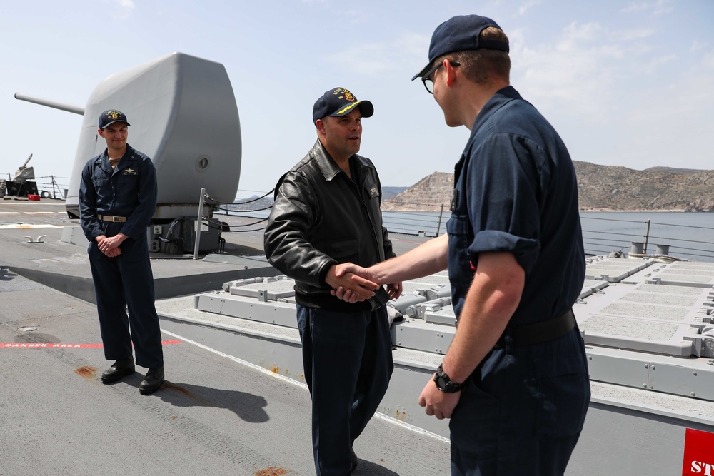 USS Ross Sailor reenlists aboard the ship