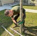 U.S. Marines from Marine Corps Security Force Regiment, Hampton Roads volunteer on Earth Day.