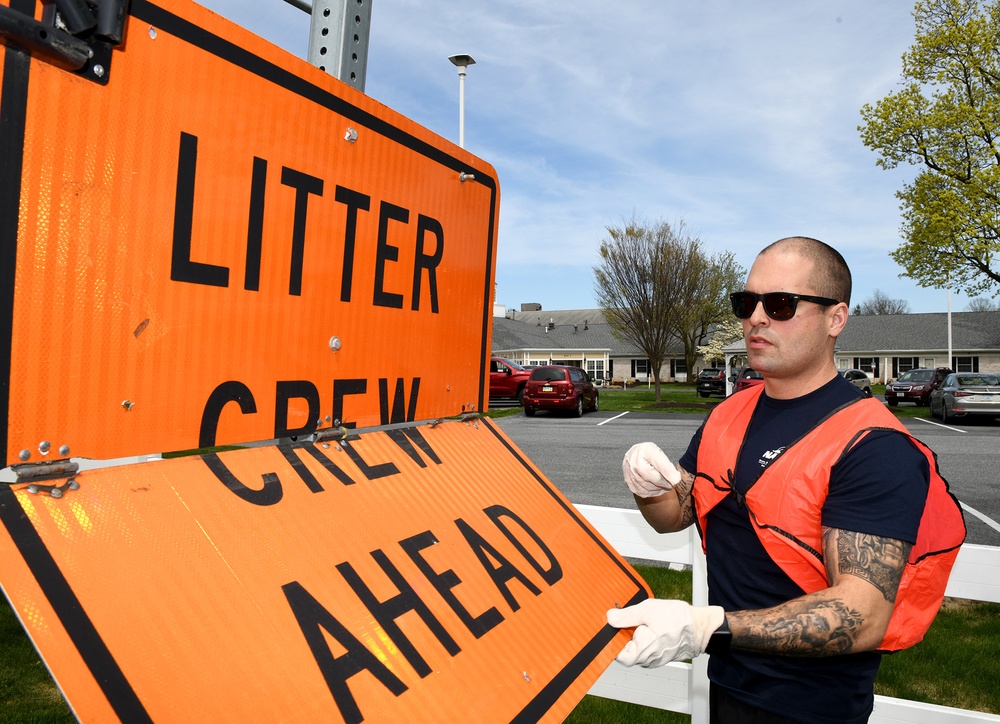 Navy Sailors, Civilians Clean Up Sporting Hill Road on Earth Day