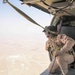 A Royal Jordanian Armed Forces Crew Chief Looks Over the Drop Zone