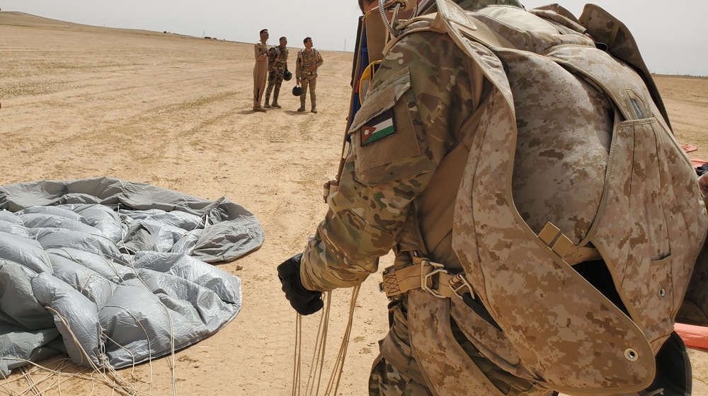 Royal Jordanian Armed Forces Operator Collects His Parachute Following a Combined Jump Exercise