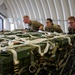 721st APS and 86th LRS Airmen load ammunition, cargo delivery for NATO