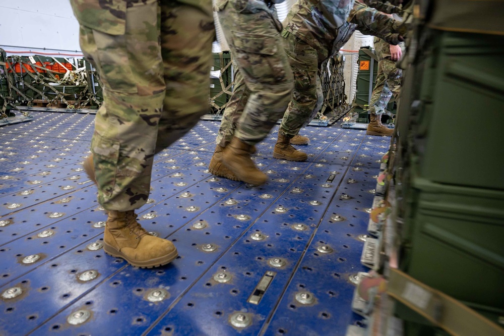 721st APS and 86th LRS Airmen load ammunition, cargo delivery for NATO