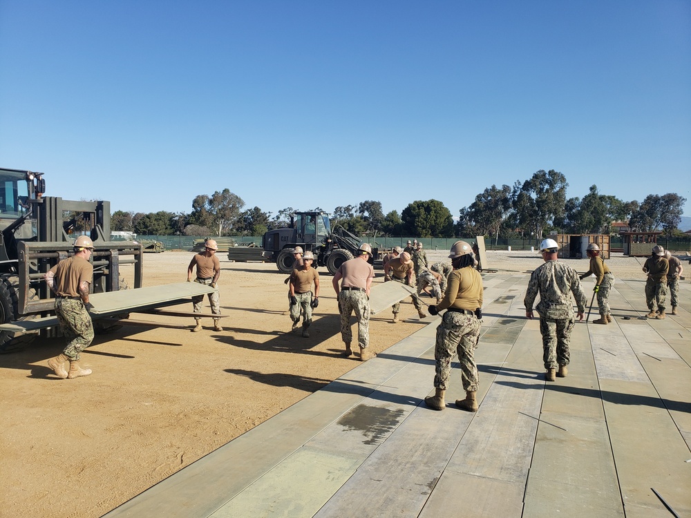 US Navy Seabees with NMCB-5 train on airfield damage repair