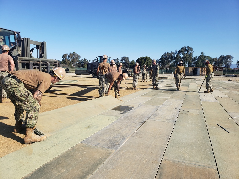 US Navy Seabees with NMCB-5 train on airfield damage repair