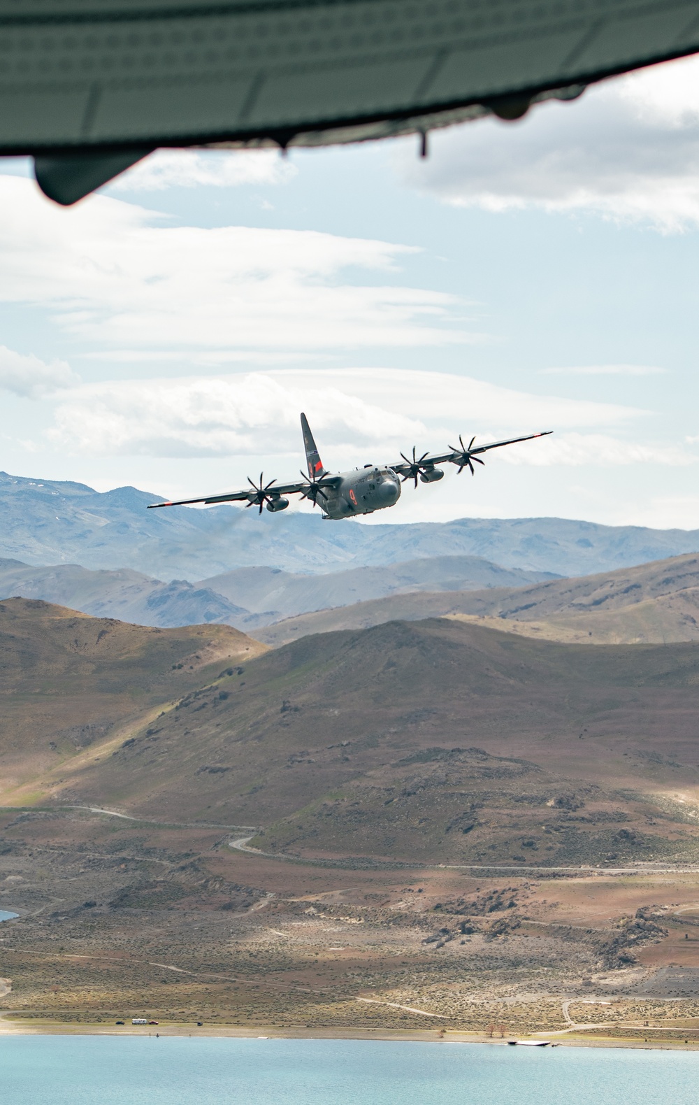 Nevada Air Guard C-130H Hercules Flies over Pyramid Lake during ESGR Boss Flight