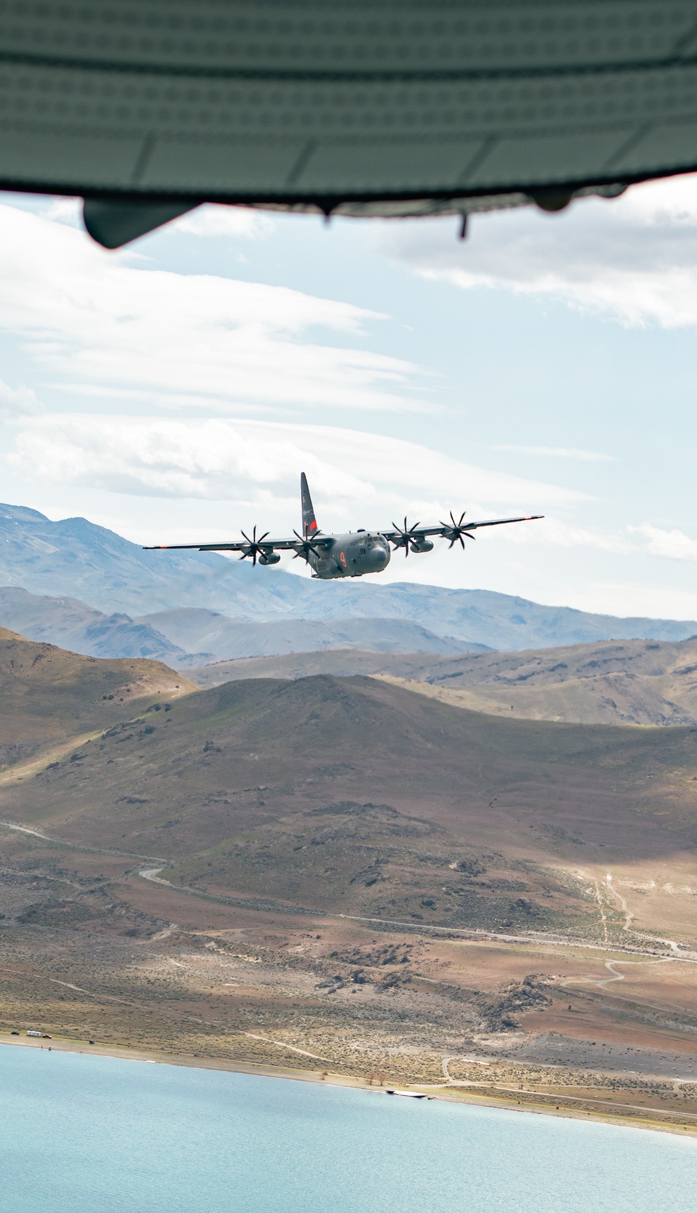 Nevada Air Guard C-130H Hercules Flies over Pyramid Lake during ESGR Boss Flight