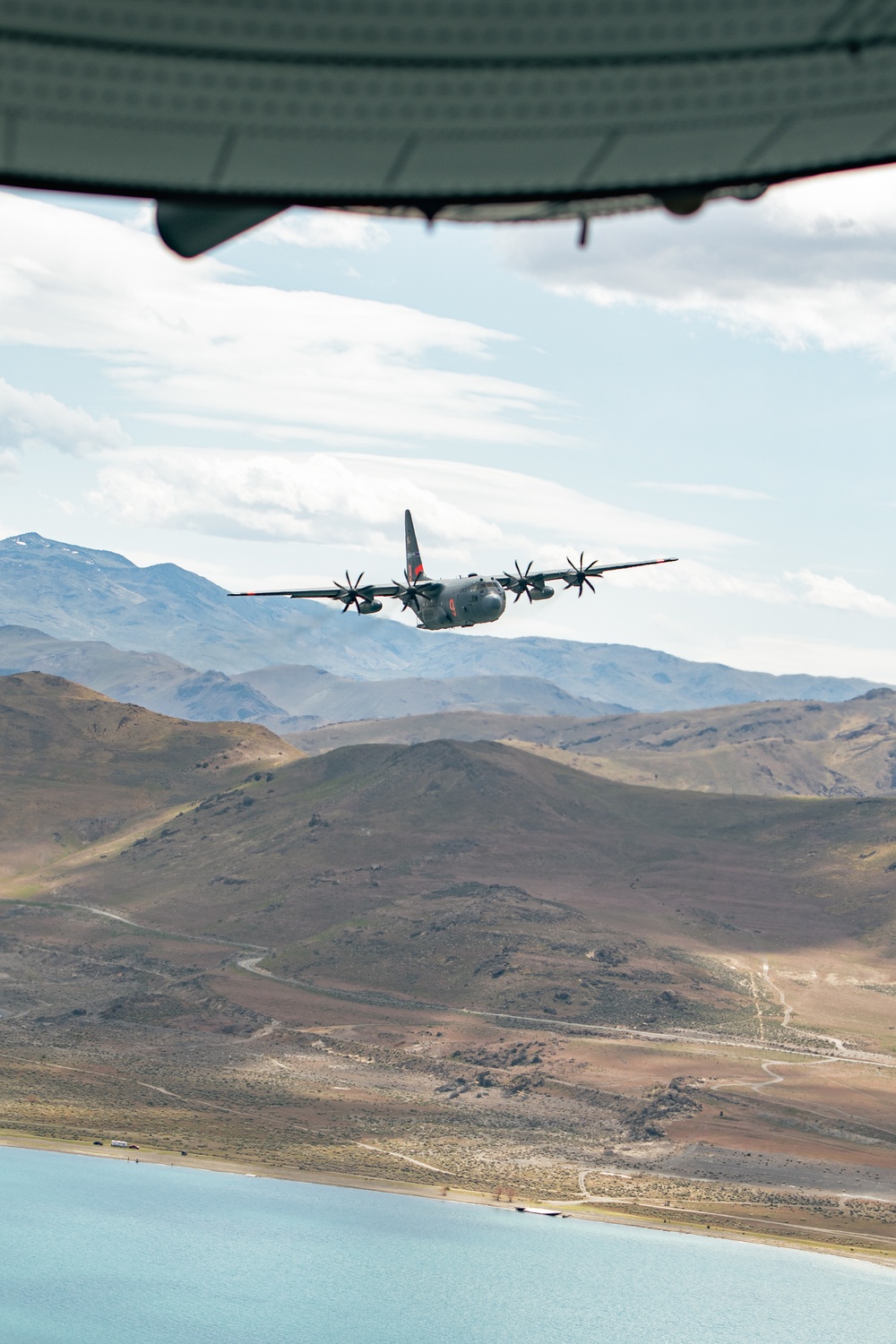 Nevada Air Guard C-130H Hercules Flies over Pyramid Lake during ESGR Boss Flight