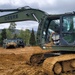 NMCB THREE Seabees takes advantage of training time in the excavator on the JLTV Operation Course