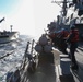 USS Ross replenishes at sea with USNS Laramie