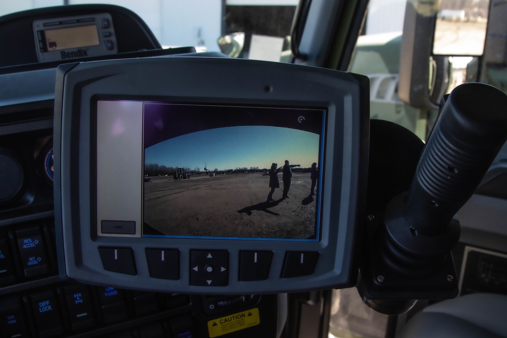 Heavy dump truck boasts backup camera and cabin monitor