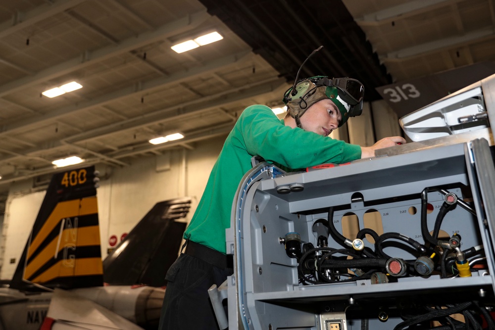 Abraham Lincoln Sailors conduct aircraft maintenance