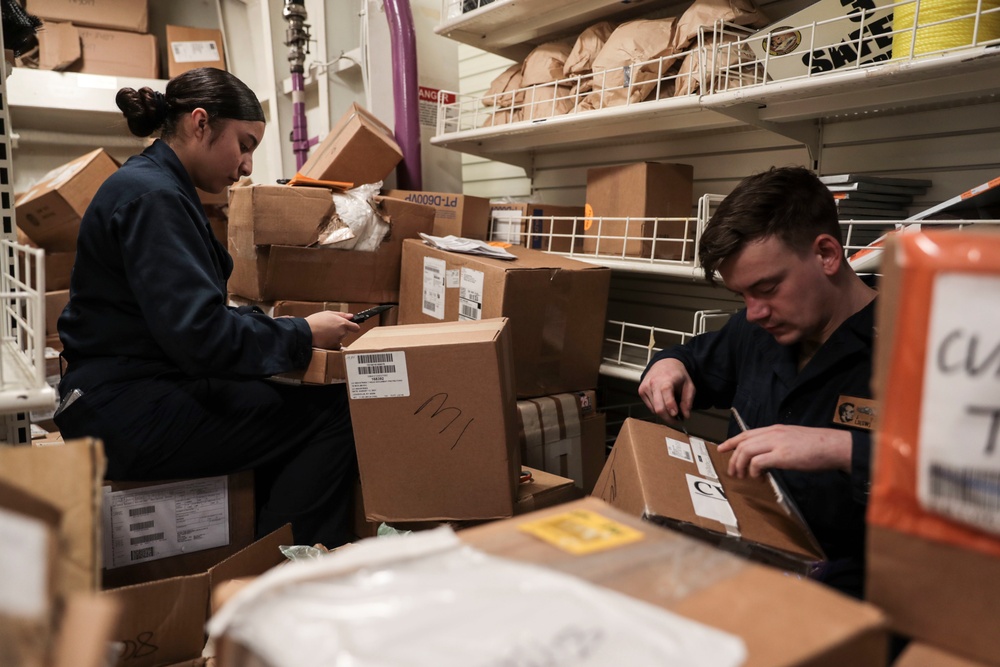 Abraham Lincoln Sailors conduct inventory