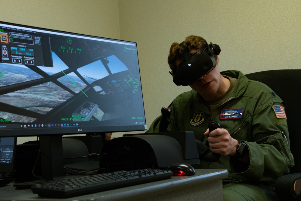 731st Airlift Squadron pilot trains on virtual simulator tool
