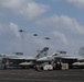 Abraham Lincoln holds an in-flight change of command ceremony for VFA-14