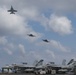 Abraham Lincoln holds an in-flight change of command ceremony for VFA-14