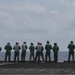 Abraham Lincoln holds an in-flight change of command ceremony for VFA-14