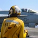 Abraham Lincoln holds an in-flight change of command ceremony for VFA-14
