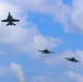 Abraham Lincoln holds an in-flight change of command ceremony for VFA-14